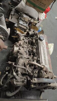 Compartimientos de camiones japoneses Usados Ensamblaje del motor en buen estado Para ISUZU NPR 4HG1T 4HG1 en venta Compartimientos usados Isuzu